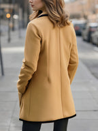 Chic Double-Breasted White Coat with Black Trim